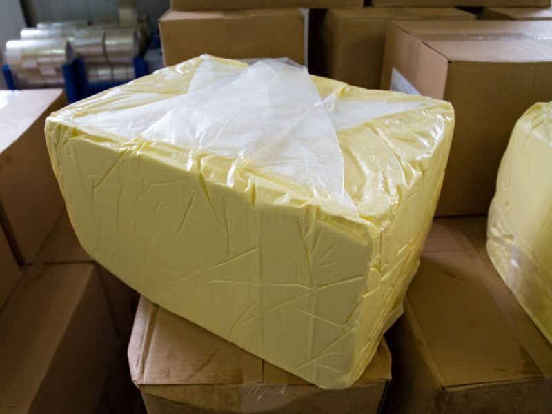Large piece of butter in the storage at the dairy plant.